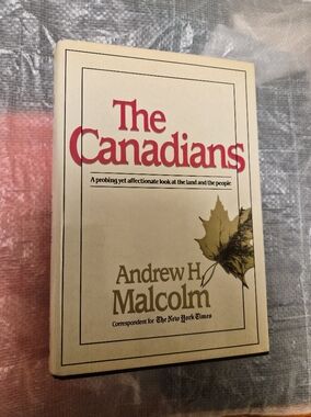 The Canadians by Andrew H. Malcolm - Cream Cover with Red Title